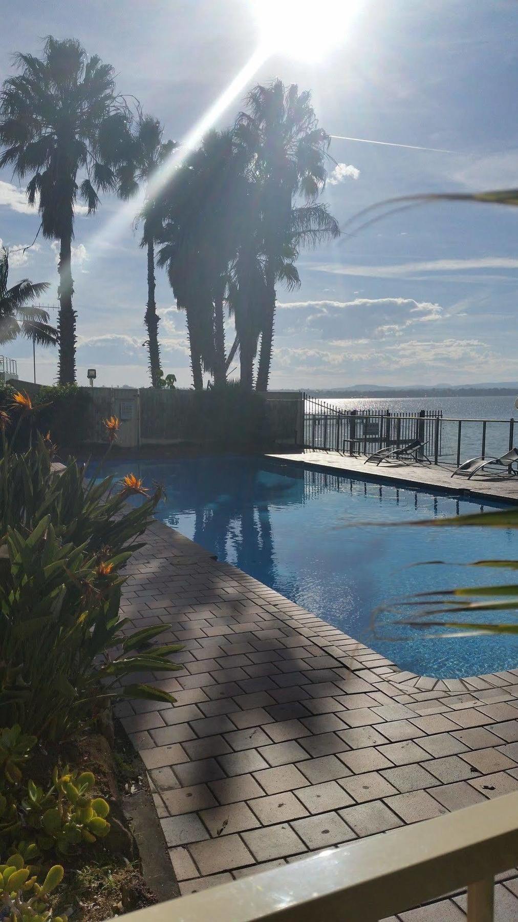 The Beachcomber Hotel & Resort, Ascend Hotel Collection Toukley Luaran gambar View of the pool at the hotel